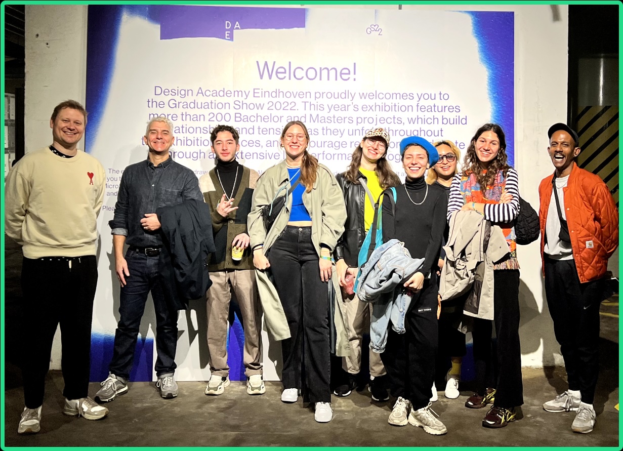 Photograph of students and staff at an exhibition during an international field trip to Dutch Design Week